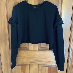 Cropped ruffle sleeve black sweater